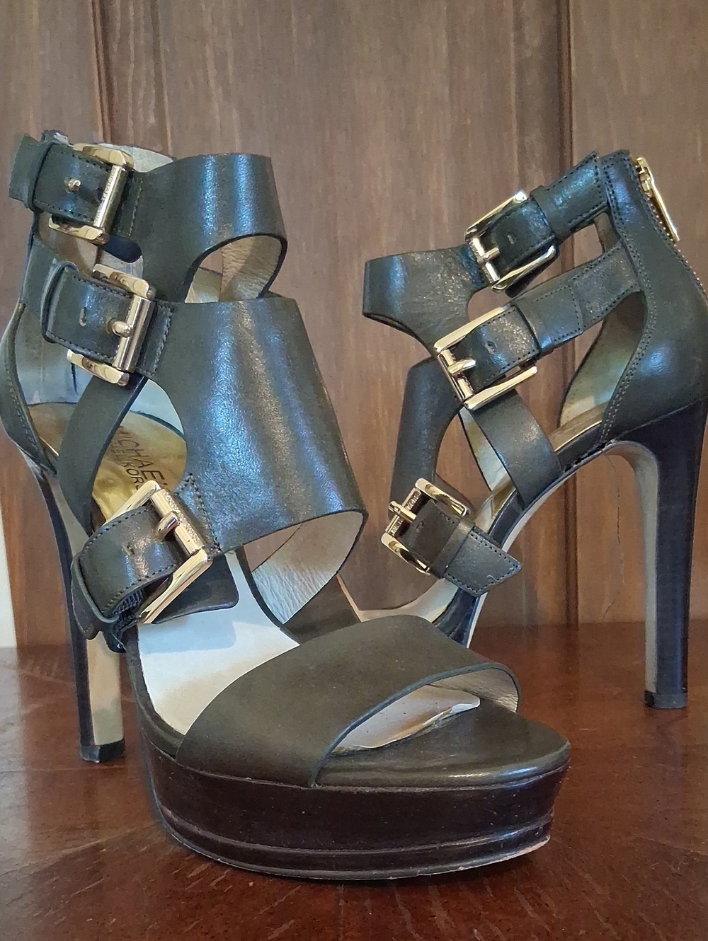 MICHAEL Michael Kors Black Leather Buckle Platform Heels with Gold Hardware